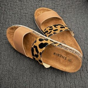 Never worn cheetah platform sandals